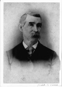 Black and White of a man with a large mustache